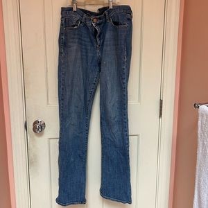 Mid rise bootcut medium wash jeans